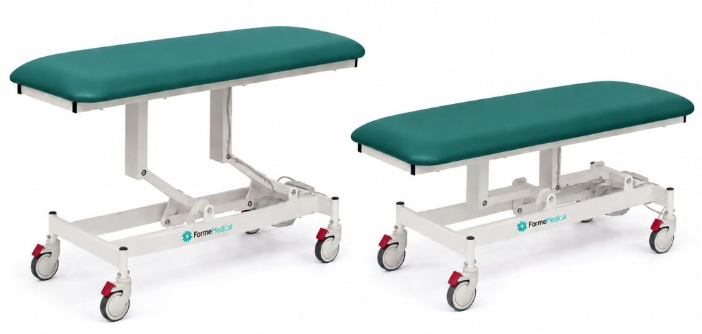 Forme Medical Jasper treatment table in teal, shown raised and lowered